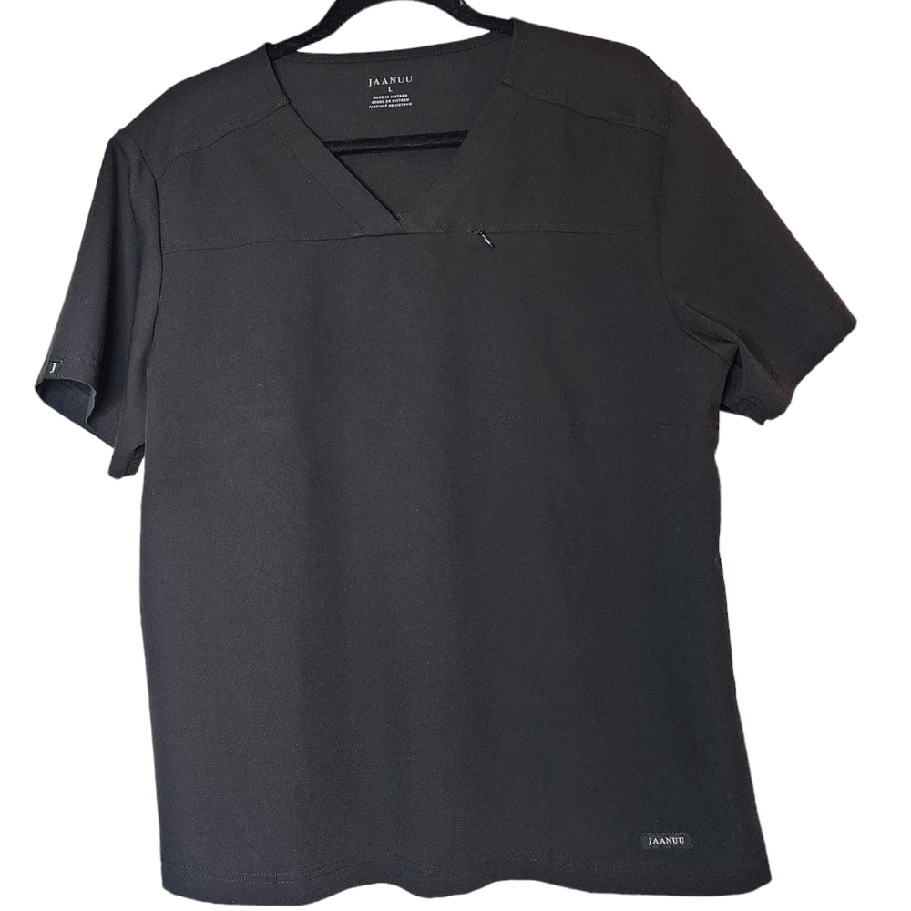 Jaanuu black scrub top. 1 zip chest pocket. Short sleeve v-neck. Women's size L